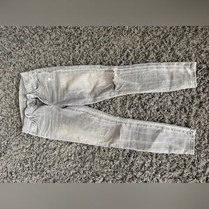 Stylish gray jeans.